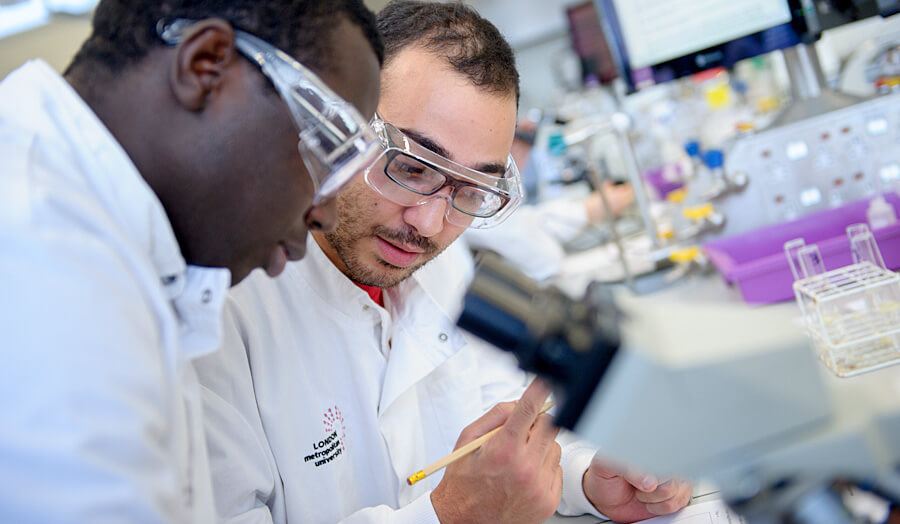 2 Male students working in the Science super lab