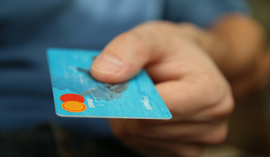 Credit card and hand