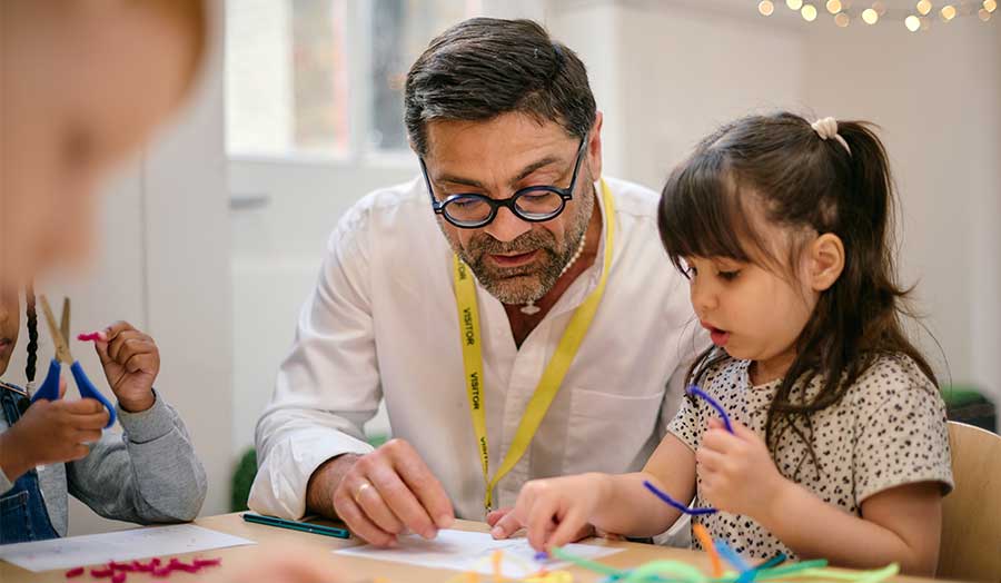Antonio working with primary school kids