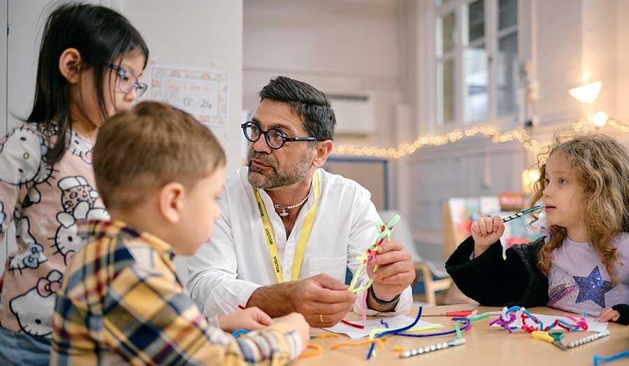 Antonio working with local children