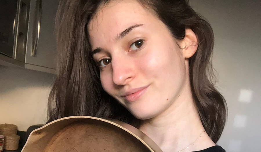 Woman holding a frying pan
