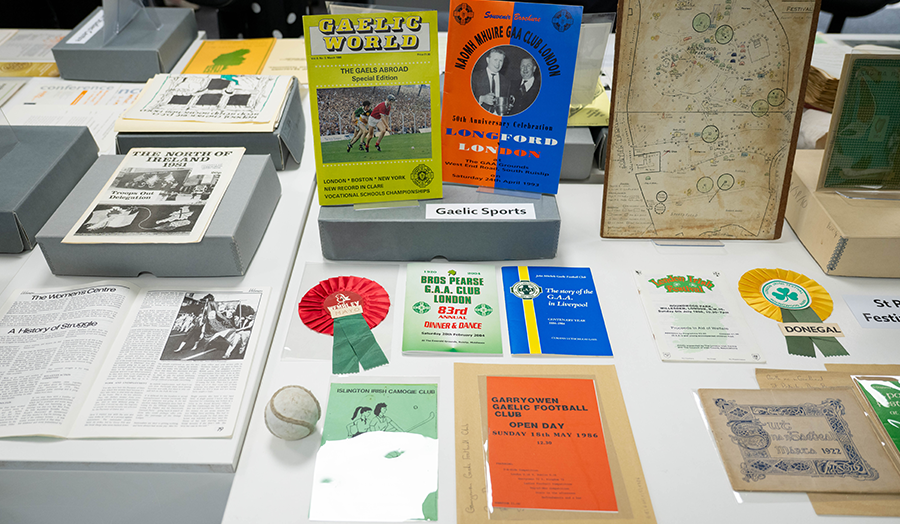 A collection of leaflets, posters and books on Irish life and culture - displayed on a white table
