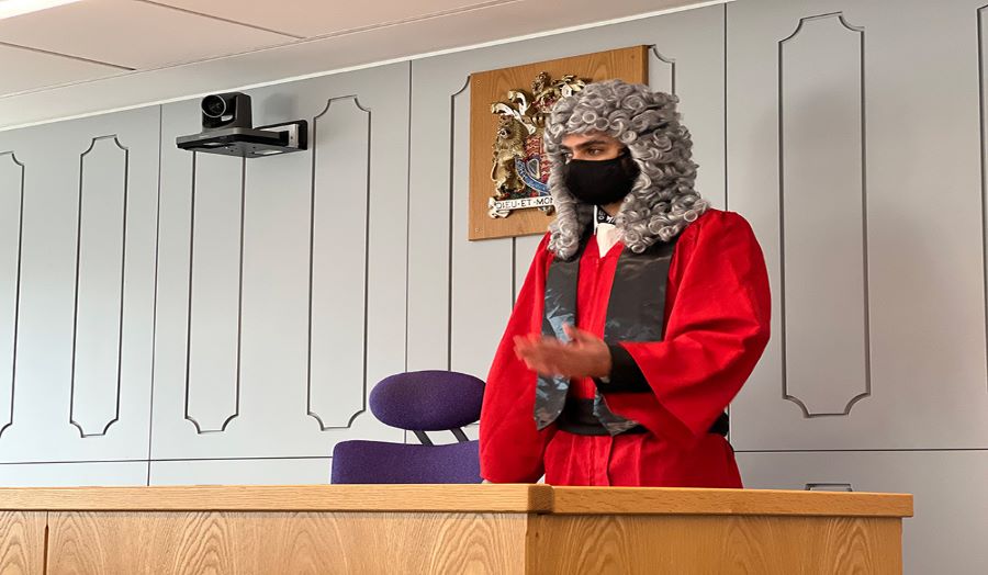 a student dressed up for mock trial