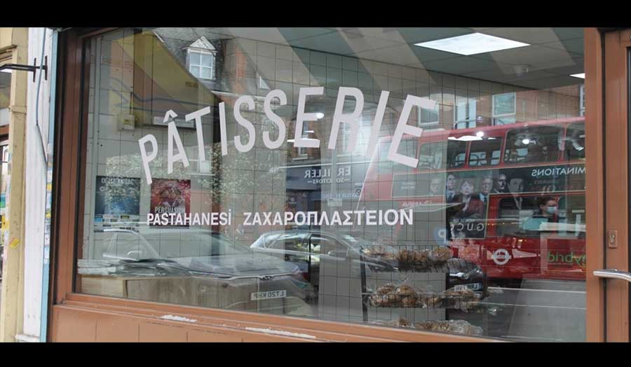 A bakery on Green Lanes with a sign in French, Greek, and Turkish