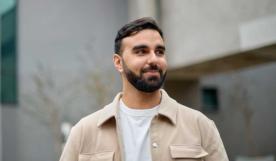 Josef outside London Met's Tower Building