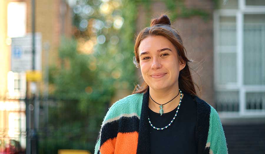 Lucy smiling outside Holloway Road campus