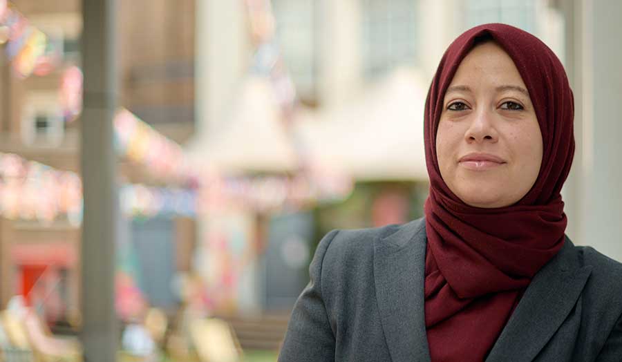 PGCE student Shahera pictured in London Met's courtyard